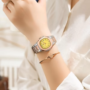 Person wearing POEDAGAR 708 Quartz Analog Watch with yellow dial and two-tone bracelet.