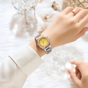 Woman wearing POEDAGAR 708 Quartz Analog Watch with yellow dial on wrist.