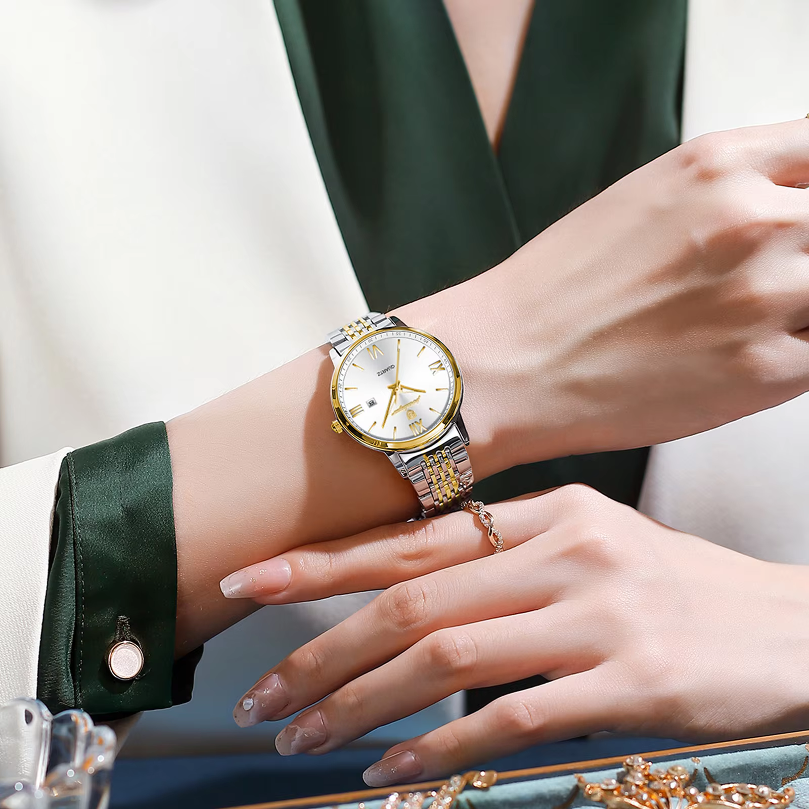 Silver and gold POEDAGAR 716 Quartz Analog Watch worn on a wrist.