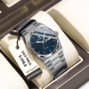 POEDAGAR 821 Quartz Analog Watch with blue patterned dial and stainless steel band.
