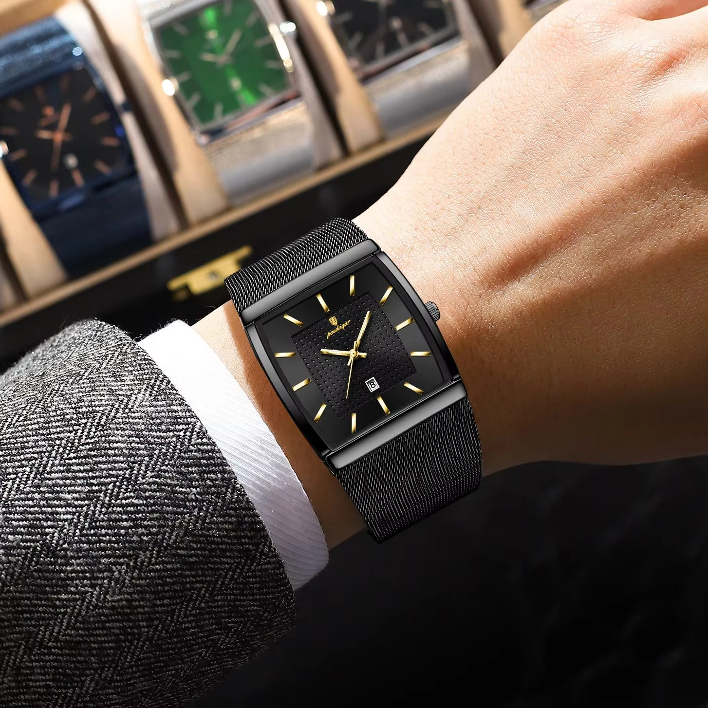 Black POEDAGAR 885 Quartz Analog Watch with black mesh strap worn on a wrist.
