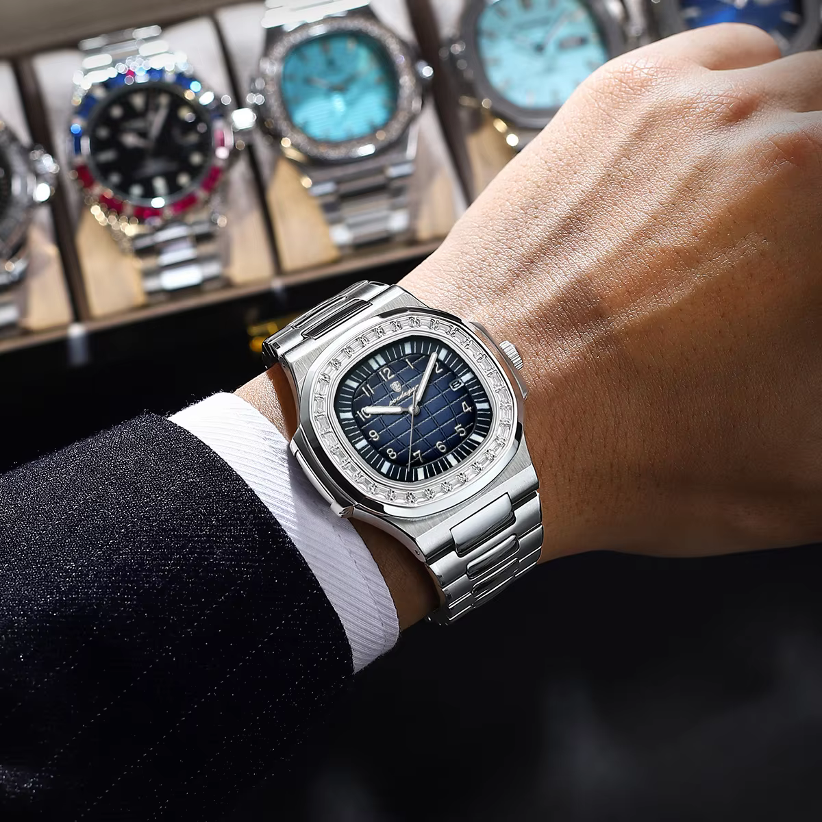 Man wearing a stainless steel POEDAGAR 925 Quartz Analog Watch with dark blue dial.