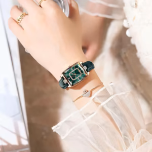 POEDAGAR 785L Quartz Analog Watch with green dial and leather strap worn on wrist.