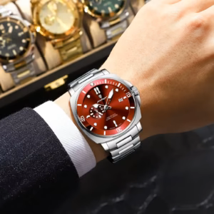 POEDAGAR 873 Quartz Analog Watch with a red dial, silver stainless steel bracelet, and date display worn on a wrist.